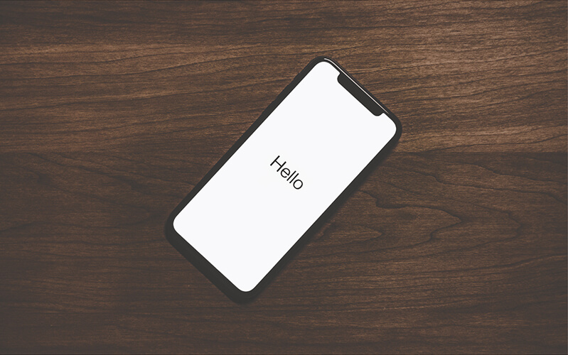 iPhone screen with "hello" displayed