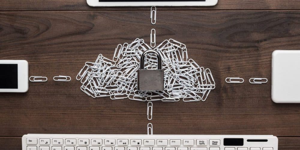 cloud security solutions concept with paper clip cloud and padlock