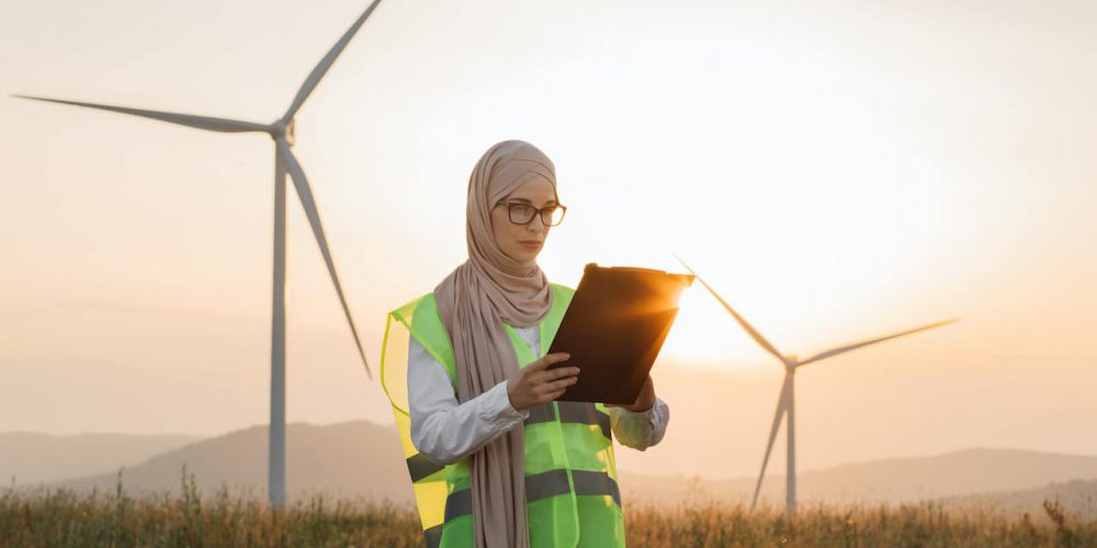 woman in agriculture using managed IT solutions in a field